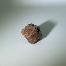 Load image into Gallery viewer, Orange skin black center garnet from Mali, Africa

