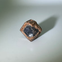Load image into Gallery viewer, Orange skin black center garnet from Mali, Africa
